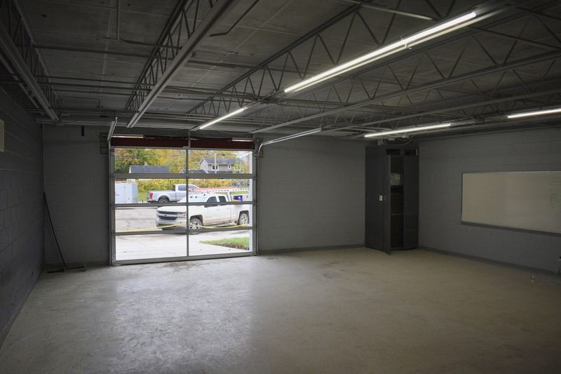 Inside a private garage suite with its glass door installed.